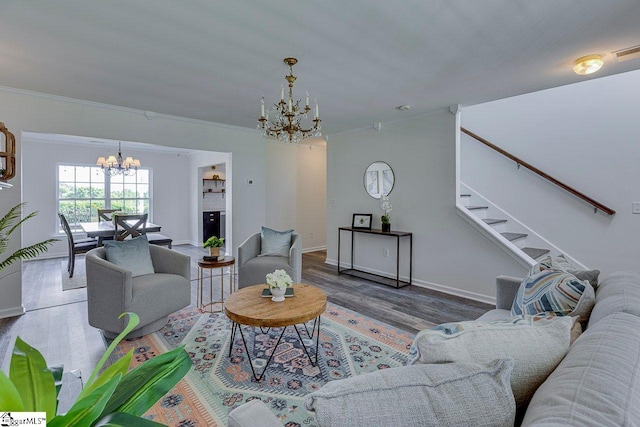 106 Hickory Valley Way, Taylors, SC 29687 - living room with crown molding, a chandelier, stairs, baseboards, and wood finished floors