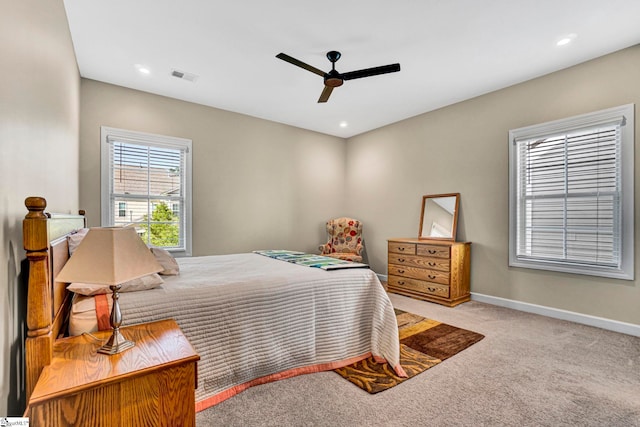carpeted bedroom with baseboards, ceiling fan, recessed lighting, and visible vents