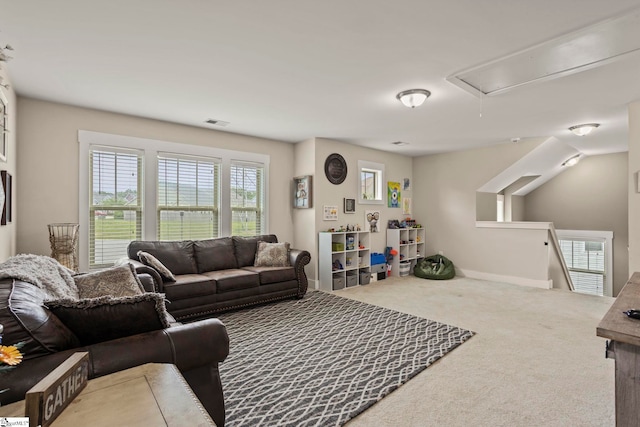 324 Runion Lake Ct, Taylors, SC 29687 - carpeted living room featuring attic access, baseboards, plenty of natural light, and visible vents