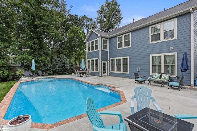 324 Runion Lake Ct, Taylors, SC 29687 - pool with an outdoor living space with a fire pit and a patio