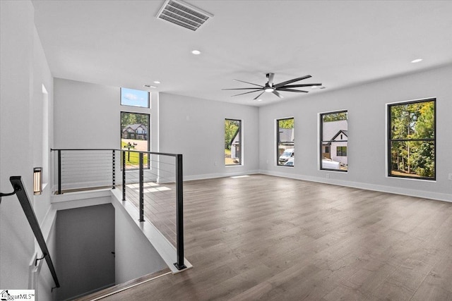 interior space with visible vents, recessed lighting, ceiling fan, and wood finished floors