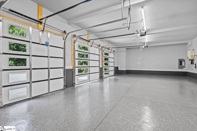 garage featuring baseboards, a garage door opener, and electric panel