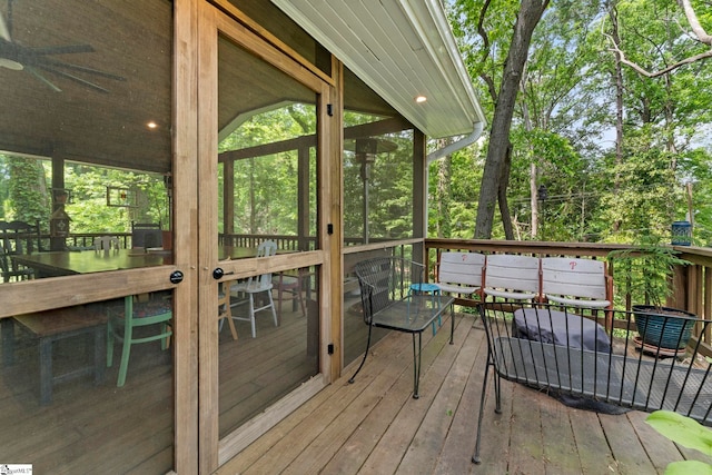 wooden terrace with a sunroom