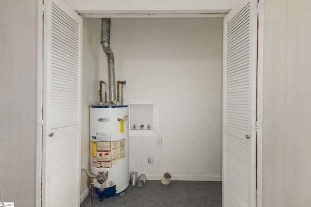utility room featuring water heater