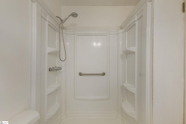 full bath featuring walk in shower and toilet