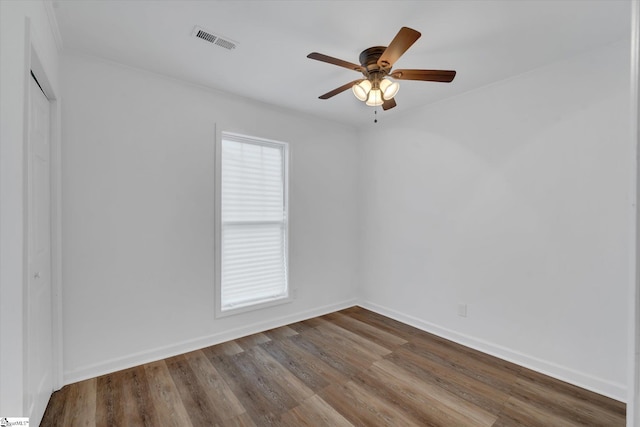 4 Burns Cir, Greenville, SC 29605 - empty room featuring baseboards, visible vents, dark wood-style flooring, and a ceiling fan