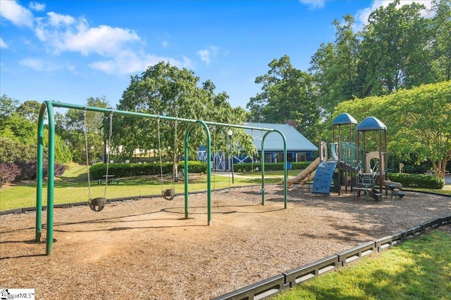 communal playground with a lawn