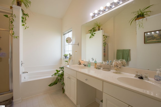 bathroom with a sink, lofted ceiling, a shower stall, and a bath