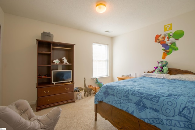 bedroom featuring carpet and visible vents