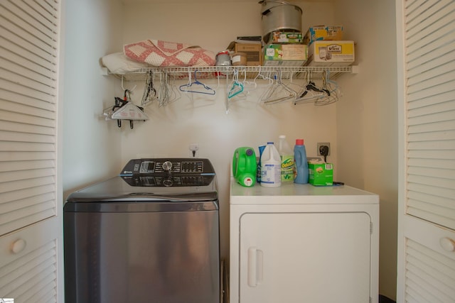 laundry area featuring laundry area and washer and dryer