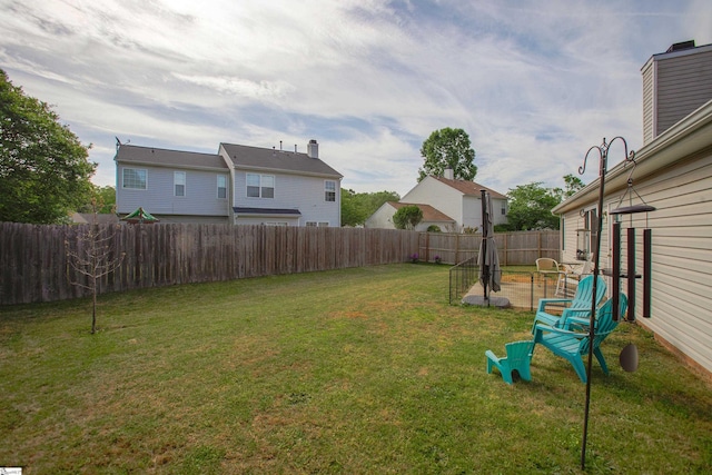 view of yard featuring a fenced backyard