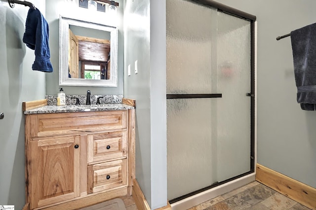 261 Joann Cir, Fair Play, SC 29643 - full bath featuring a stall shower, baseboards, stone finish flooring, and vanity