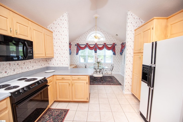 kitchen with lofted ceiling, light brown cabinetry, black appliances, and wallpapered walls