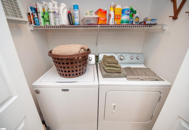 laundry area with independent washer and dryer and laundry area