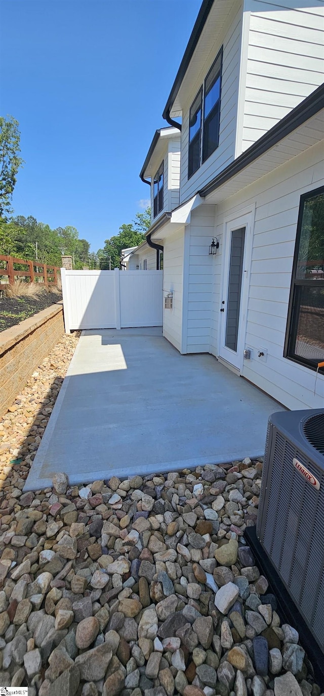 317 Breakwater Ln, Seneca, SC 29678 - view of patio featuring central air condition unit and fence