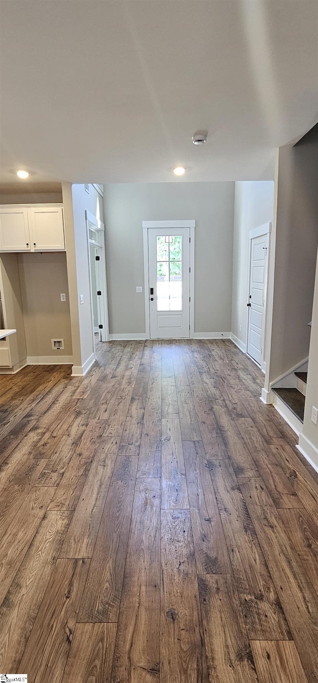 317 Breakwater Ln, Seneca, SC 29678 - unfurnished living room with dark wood-type flooring, baseboards, stairway, and recessed lighting