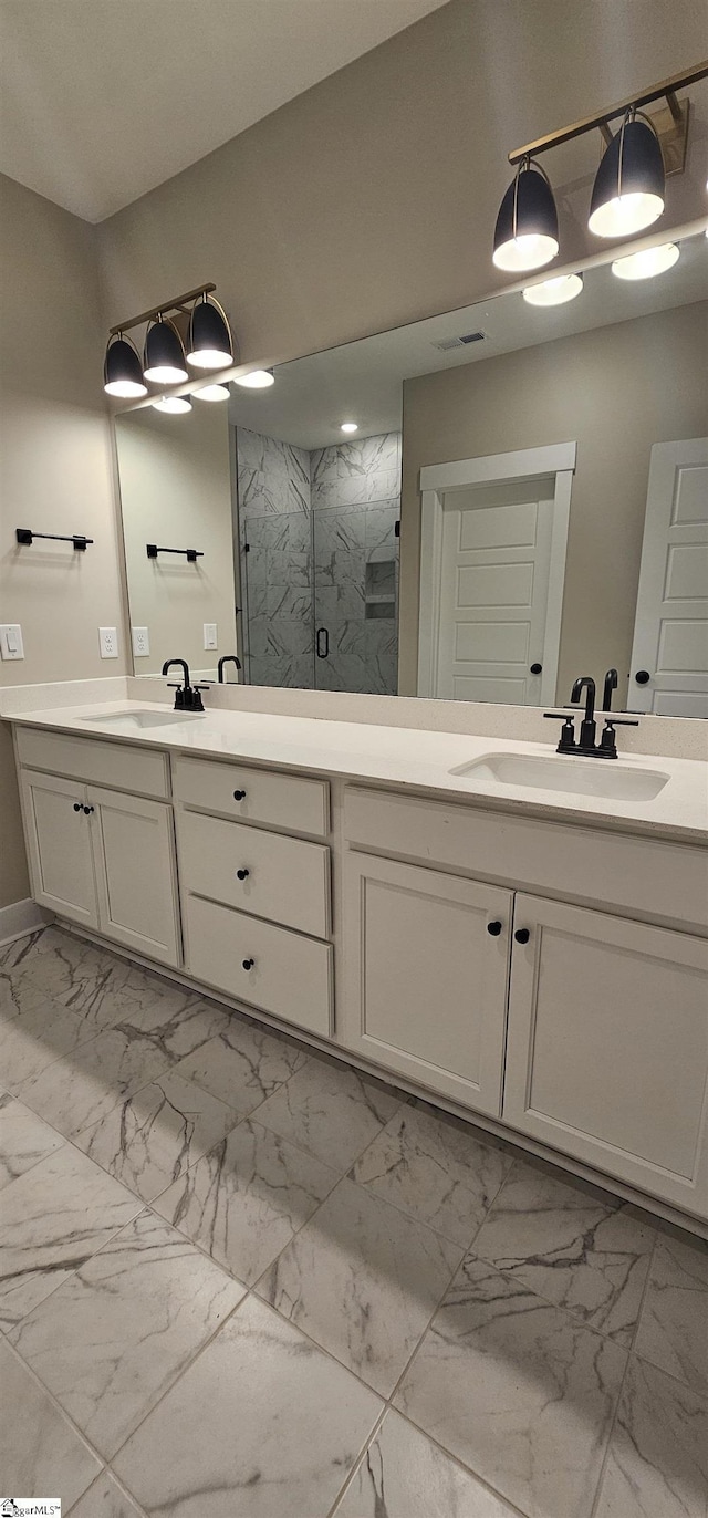 317 Breakwater Ln, Seneca, SC 29678 - full bath with marble finish floors, a marble finish shower, and double vanity