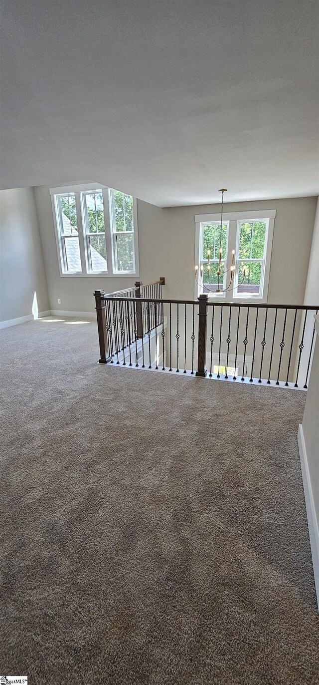 317 Breakwater Ln, Seneca, SC 29678 - carpeted empty room with plenty of natural light and baseboards