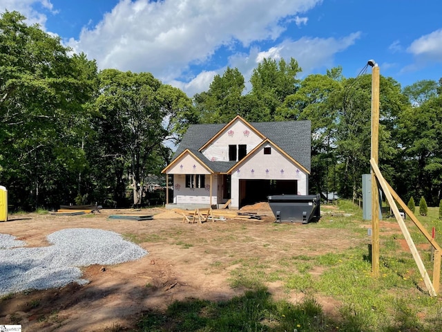view of front of house with roof with shingles