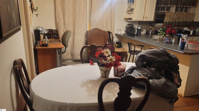 dining room with wood finished floors