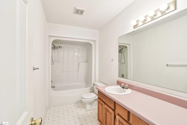 bathroom featuring toilet, vanity, a textured ceiling, visible vents, and  shower combination