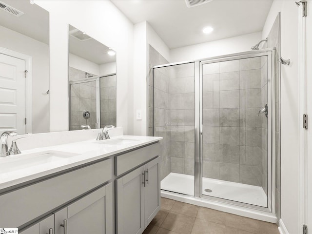 112 Arrow Ct, Greer, SC 29651 - full bath with tile patterned flooring, a stall shower, double vanity, and recessed lighting