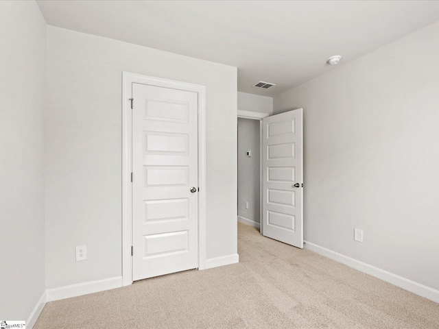 122 Arrow Ct, Greer, SC 29651 - unfurnished bedroom with light colored carpet and baseboards