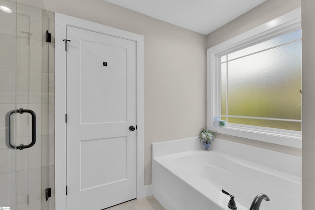 555 Canewood Ln, Campobello, SC 29322 - full bathroom featuring tile patterned floors, a bath, and a stall shower