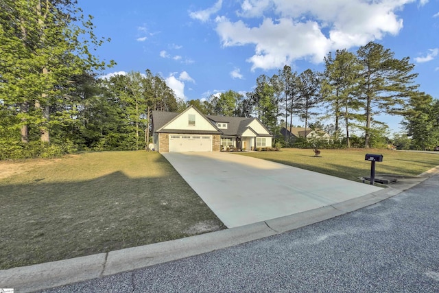 555 Canewood Ln, Campobello, SC 29322 - view of front of property featuring a garage, driveway, brick siding, and a front yard
