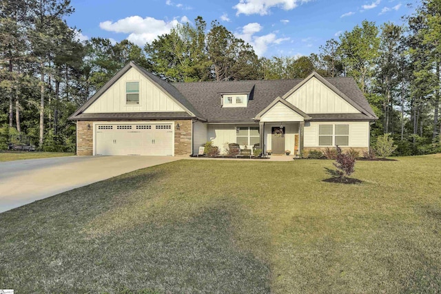 555 Canewood Ln, Campobello, SC 29322 - view of front of house with stone siding, concrete driveway, a garage, a front yard, and board and batten siding