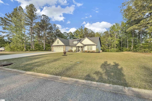 555 Canewood Ln, Campobello, SC 29322 - view of front facade featuring a front lawn, concrete driveway, a garage, and board and batten siding