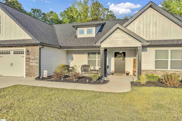 555 Canewood Ln, Campobello, SC 29322 - craftsman-style house with a front lawn, board and batten siding, roof with shingles, and stone siding