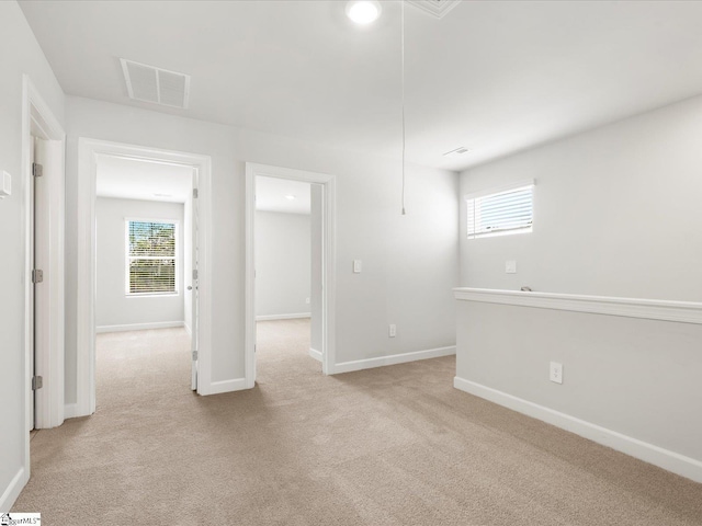 126 Arrow Ct, Greer, SC 29651 - spare room with light colored carpet and plenty of natural light