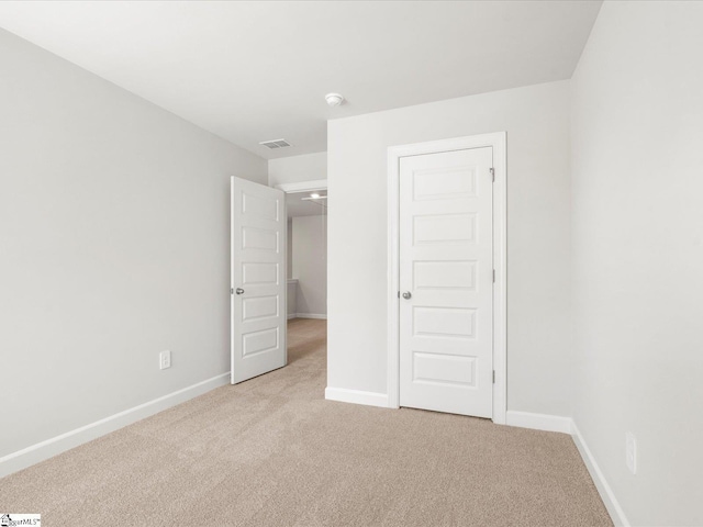126 Arrow Ct, Greer, SC 29651 - unfurnished bedroom with light carpet and baseboards