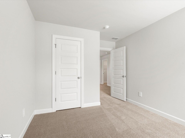 126 Arrow Ct, Greer, SC 29651 - unfurnished bedroom featuring light colored carpet and baseboards