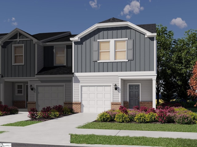 view of front of property featuring board and batten siding, brick siding, and a garage