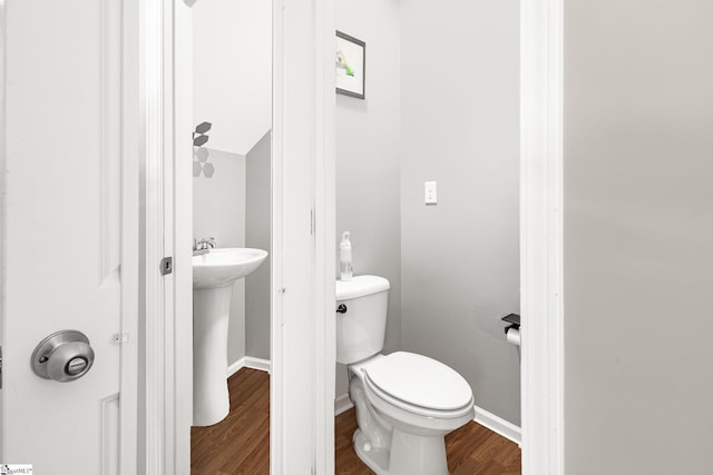 301 Glenlea Ln, Greenville, SC 29617 - half bathroom with toilet, baseboards, and wood finished floors