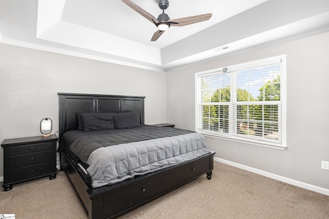 301 Glenlea Ln, Greenville, SC 29617 - carpeted bedroom with a ceiling fan, a tray ceiling, visible vents, baseboards, and ornamental molding