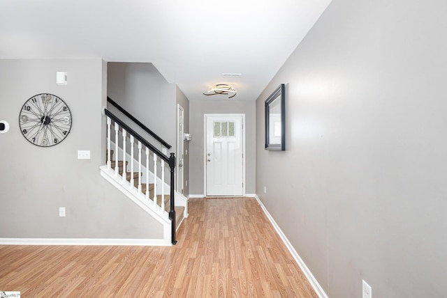 301 Glenlea Ln, Greenville, SC 29617 - entryway featuring stairway, light wood-style flooring, and baseboards
