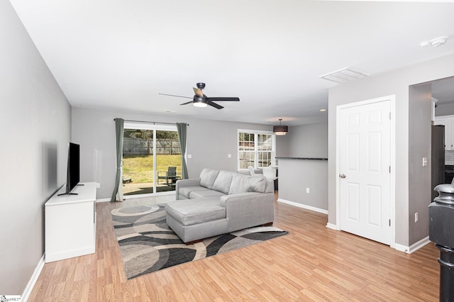 301 Glenlea Ln, Greenville, SC 29617 - living room with visible vents, light wood-style flooring, baseboards, and ceiling fan