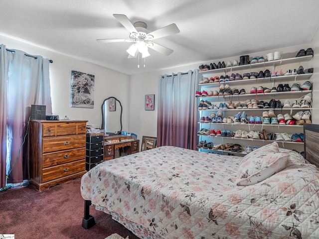 bedroom featuring a ceiling fan and carpet floors