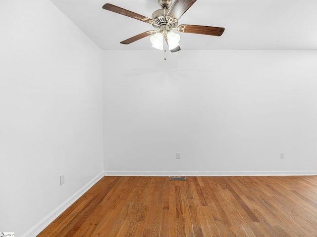 797 Jackson St, Spartanburg, SC 29303 - spare room with visible vents, wood finished floors, and baseboards