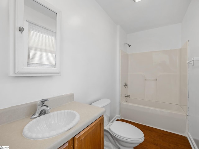 797 Jackson St, Spartanburg, SC 29303 - bathroom with toilet, shower / bathtub combination, vanity, and wood finished floors