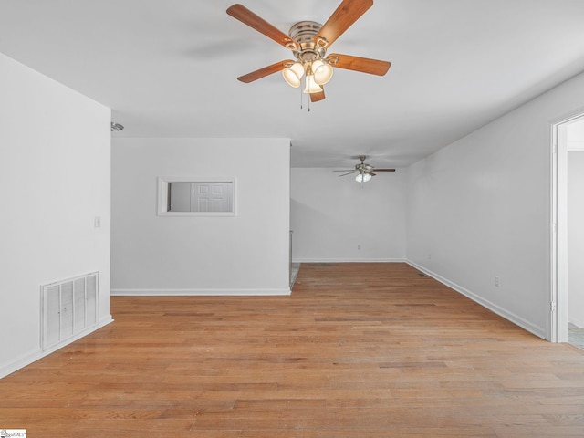 797 Jackson St, Spartanburg, SC 29303 - empty room featuring baseboards, ceiling fan, light wood finished floors, and visible vents