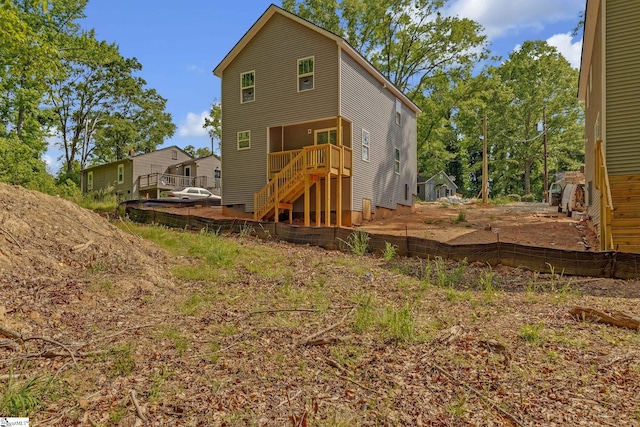 back of house with stairway