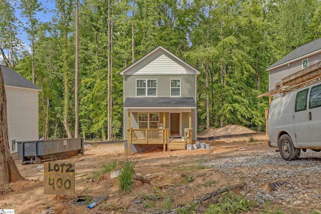 view of front of property featuring covered porch