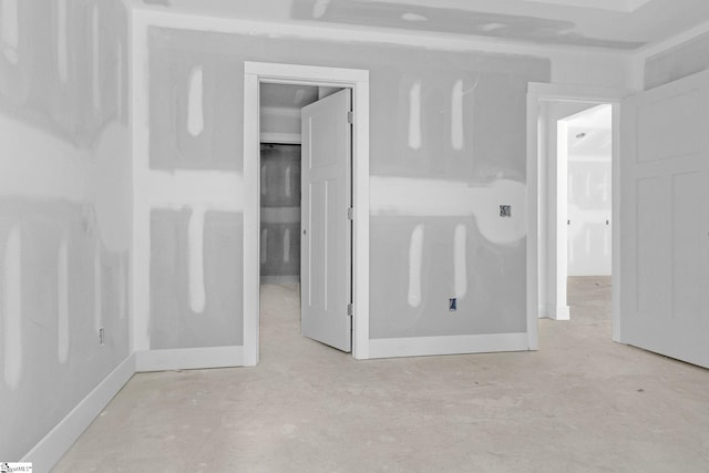 unfurnished bedroom featuring baseboards