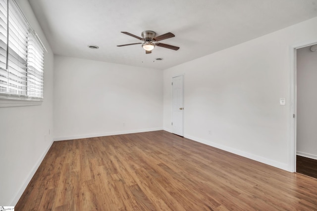 5 Huntley Castle Ct, Taylors, SC 29687 - empty room with ceiling fan, baseboards, visible vents, and wood finished floors