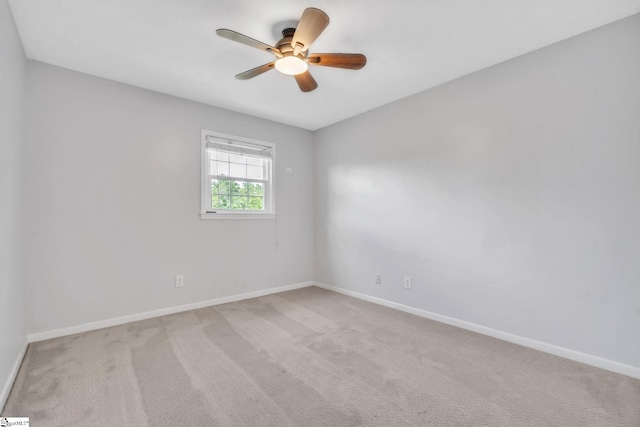 5 Huntley Castle Ct, Taylors, SC 29687 - spare room featuring light carpet, baseboards, and a ceiling fan