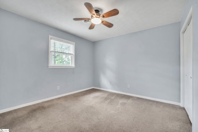 5 Huntley Castle Ct, Taylors, SC 29687 - unfurnished bedroom with baseboards, carpet flooring, a closet, and a ceiling fan